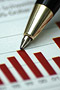 Photograph of a pen on a bar graph